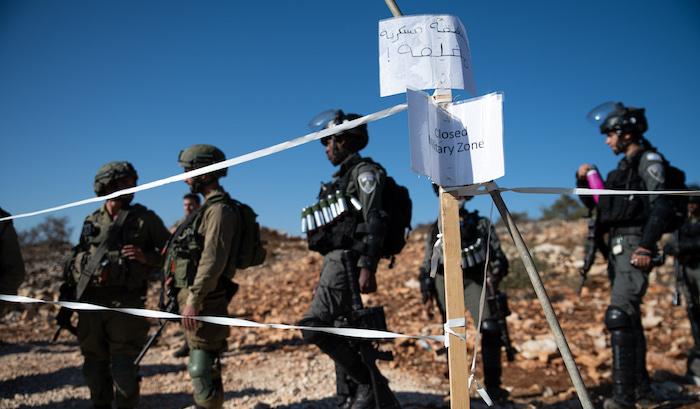Security forces confiscate illegal weapons, terror-linked money in West Bank