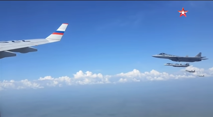 Watch: Russian Su-57 Stealth Fighters Escort Putin’s Presidential Aircraft